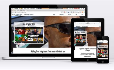 A homepage with a large hero image of a Black man wearing thin sunglasses, with the tagline `See at your best.`
