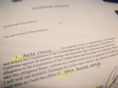 Close-up of the Oath of Office, State of California, City and County of San Francisco. I, Anita Cheng, do solemnly swear (or affirm) that I will support and defend the Constitution of the United States and the Constitution of the State of California against all enemies, foreign and domestic; that I will bear true faith and allegiance to the Constitution of the United States and the State of California, that I take this obligation freely, without any mental reservation or purpose of evasion....that I will...faithfully discharge the duties upon which I am about to enter...as I hold the office of senior business analyst.