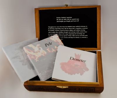 All 3 CDs presented inside the box.